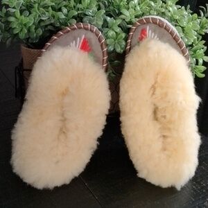 Cozy Sheepskin Slippers with Floral Detail